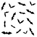 Silhouettes of flying bats isolated on white background Royalty Free Stock Photo